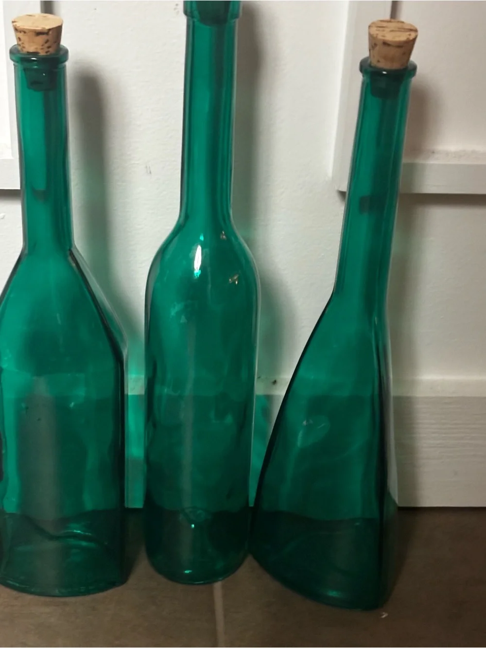 English Georgian green blown glass bottle-shape decanters set of 3